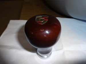 356/550 PORSCHE REPLICA Steering wheel, shift knob, helmet faring.